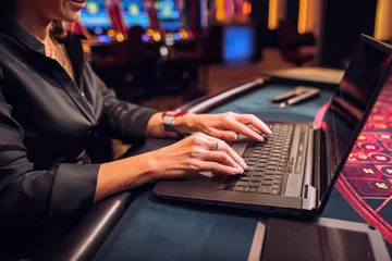 A laptop glowing with a bright login prompt in a minimalistic setup, symbolizing the protected access system at 4777BIT.